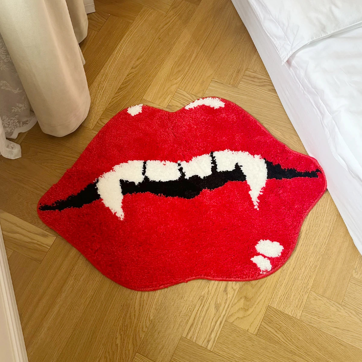 Alfombra labios de vampiro en un baño